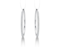 Load image into Gallery viewer, A pair of silver hoop earrings with pavé-set clear stones,