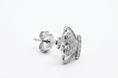 Load image into Gallery viewer, Crown shaped silver earrings with cubic zirconia