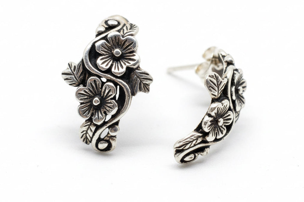 Pair of silver floral earrings 