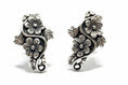Load image into Gallery viewer, Pair of silver floral earrings 
