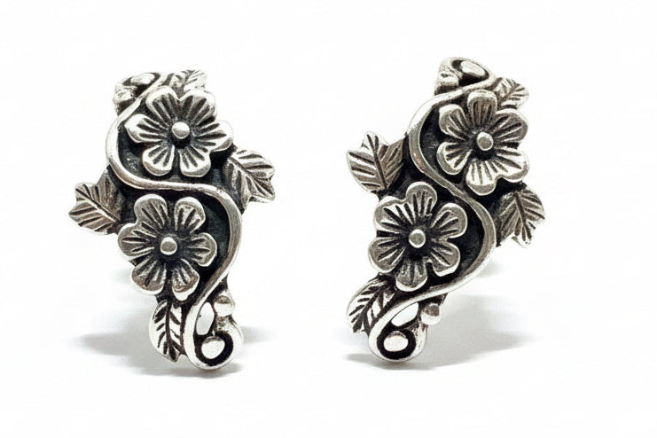 Pair of silver floral earrings 