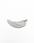 Load image into Gallery viewer, A silver angel wing pendant with detailed textured feathers and a polished bail,
