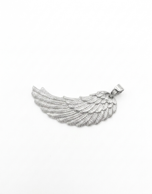 A silver angel wing pendant with detailed textured feathers and a polished bail,