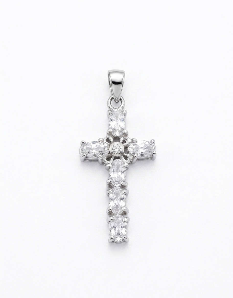 A silver cross pendant adorned with clear CZ centre flower design
