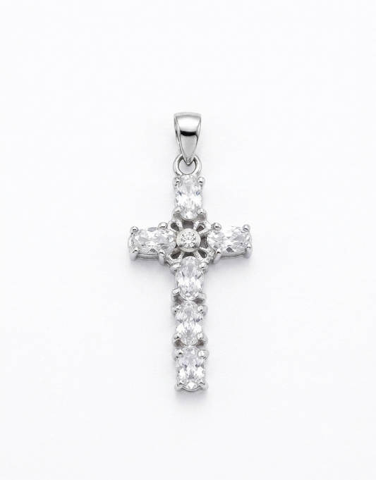 A silver cross pendant adorned with clear CZ centre flower design