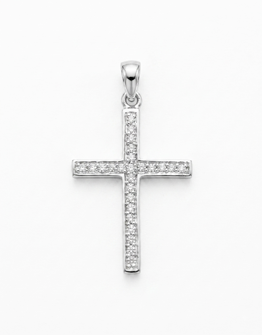 A silver cross pendant adorned with small clear stones,