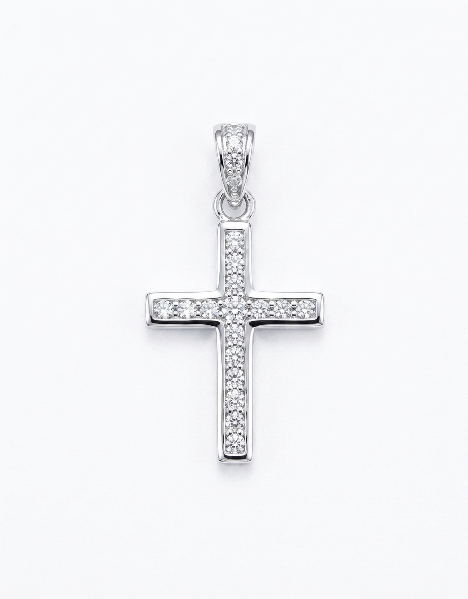 A silver cross pendant embellished with clear pavé stones,