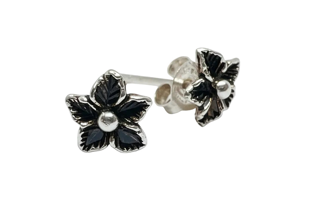 silver flower-shaped earrings 