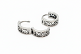 Load image into Gallery viewer, Pair of silver hoop earrings with intricate designs 
