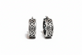 Load image into Gallery viewer, Pair of silver hoop earrings with intricate designs 
